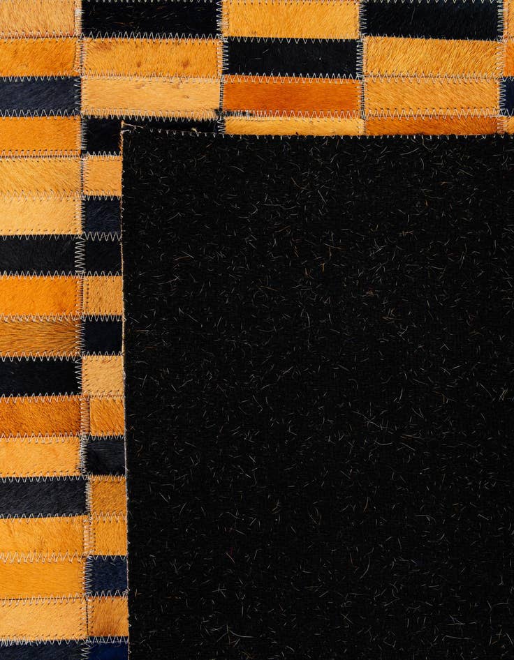 Detail image of  5' 1 x 7' 11 Cowhide - Patchwork Rug