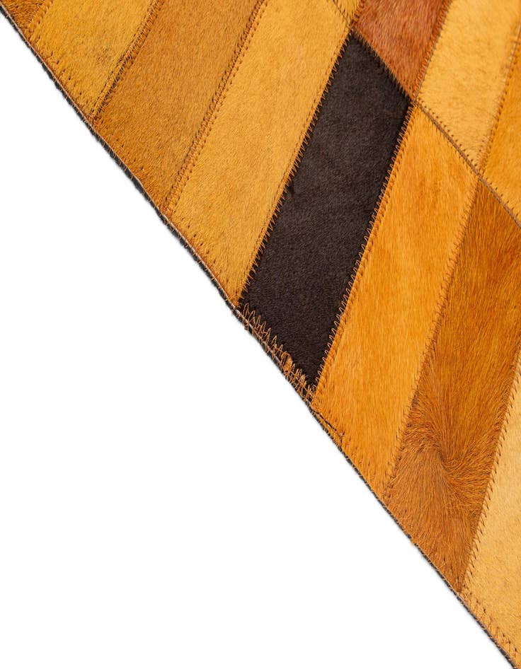 Detail image of  5' 1 x 7' 11 Cowhide - Patchwork Rug