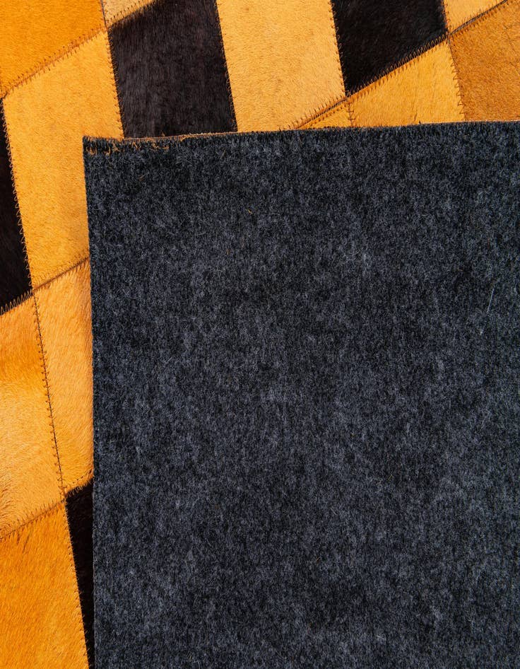 Detail image of  5' 2 x 8' Cowhide Stocks Rug