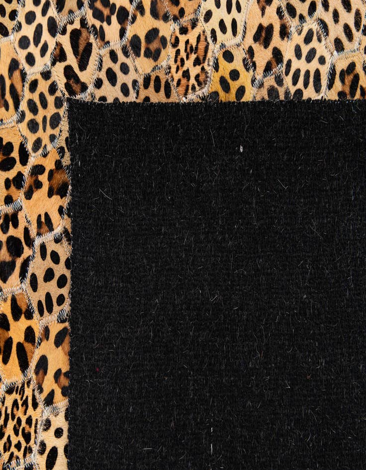 Detail image of  5' x 7' 11 Cowhide Stocks Rug