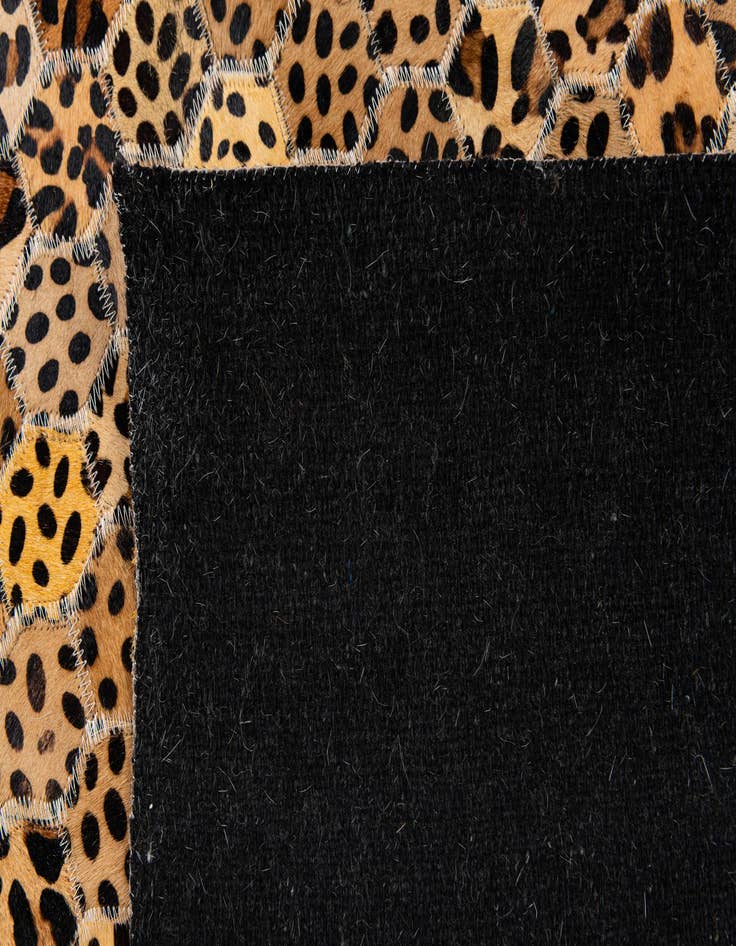 Detail image of  5' x 7' 11 Cowhide Stocks Rug