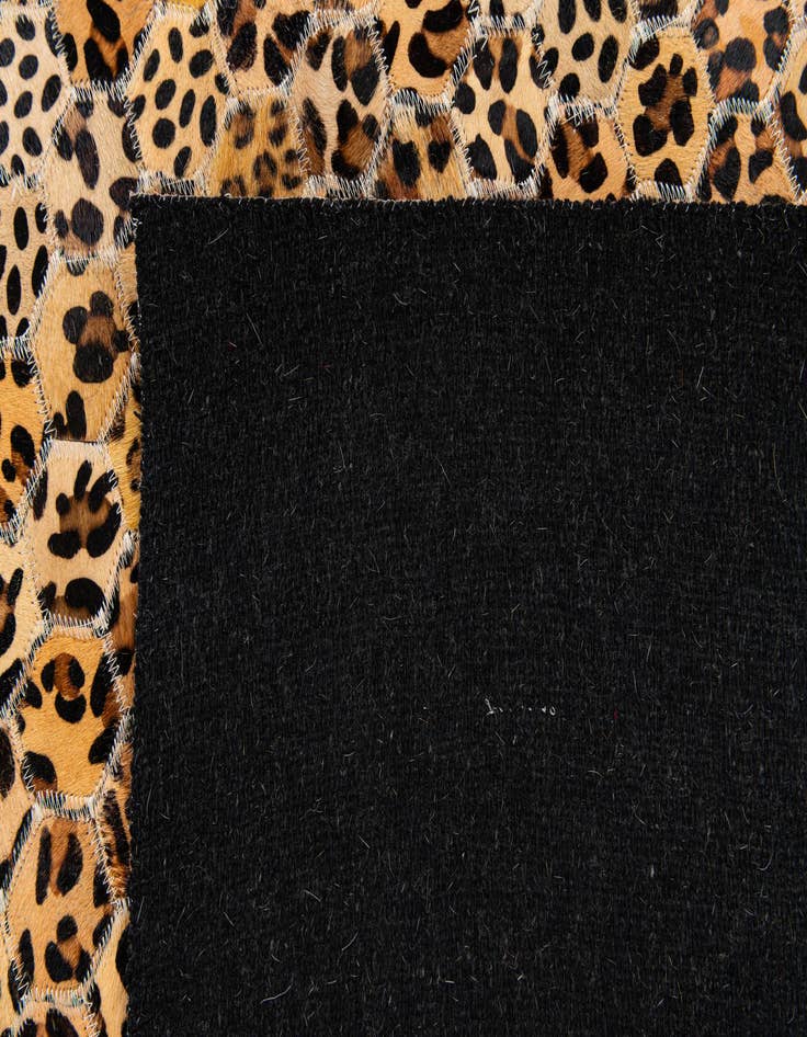 Detail image of  5' x 7' 11 Cowhide Stocks Rug