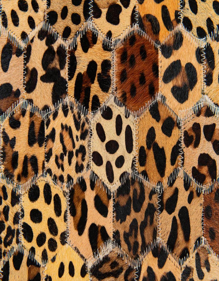 Detail image of  5' 1 x 8' Cowhide Stocks Rug