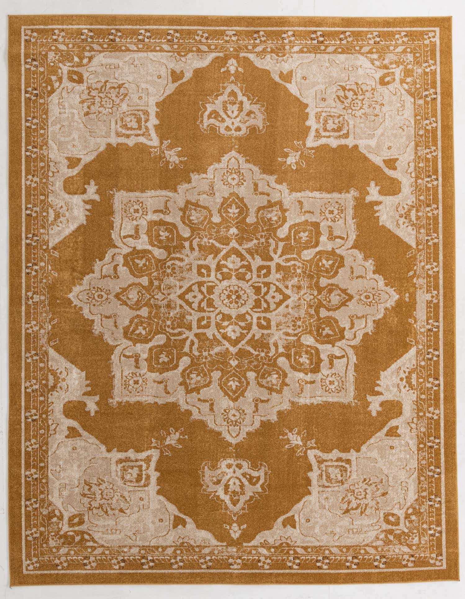 A 9x12 rectangular Eden Collection rug with a distressed gold and cream medallion pattern, ideal for a living room.