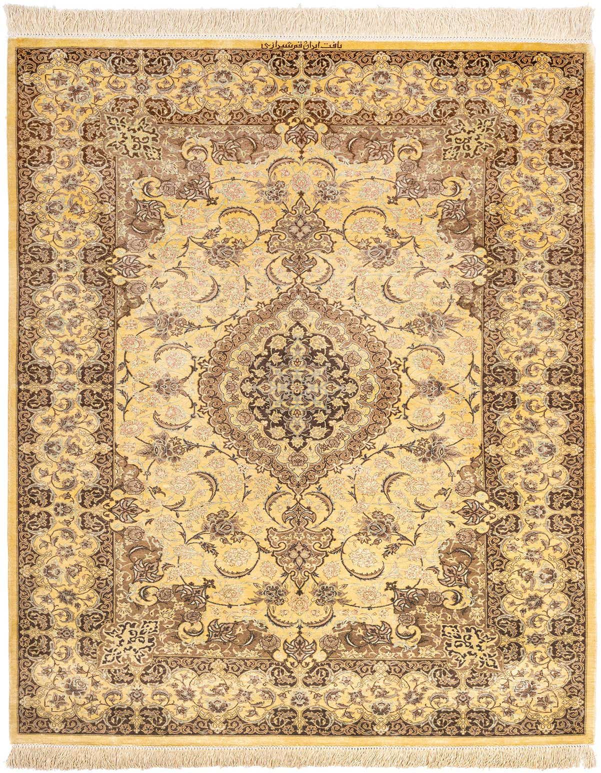 A 3x5 rectangular yellow Persian silk rug with an intricate gold and brown floral medallion pattern.