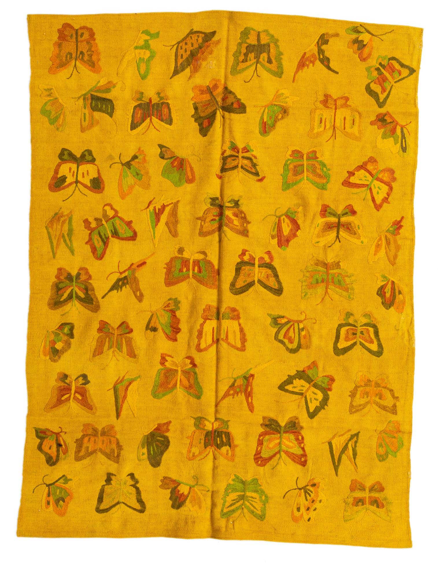 A 5x8 rectangular yellow flatweave wool rug featuring a vibrant, repeating pattern of colorful butterflies in various shades of green, orange, and brown.