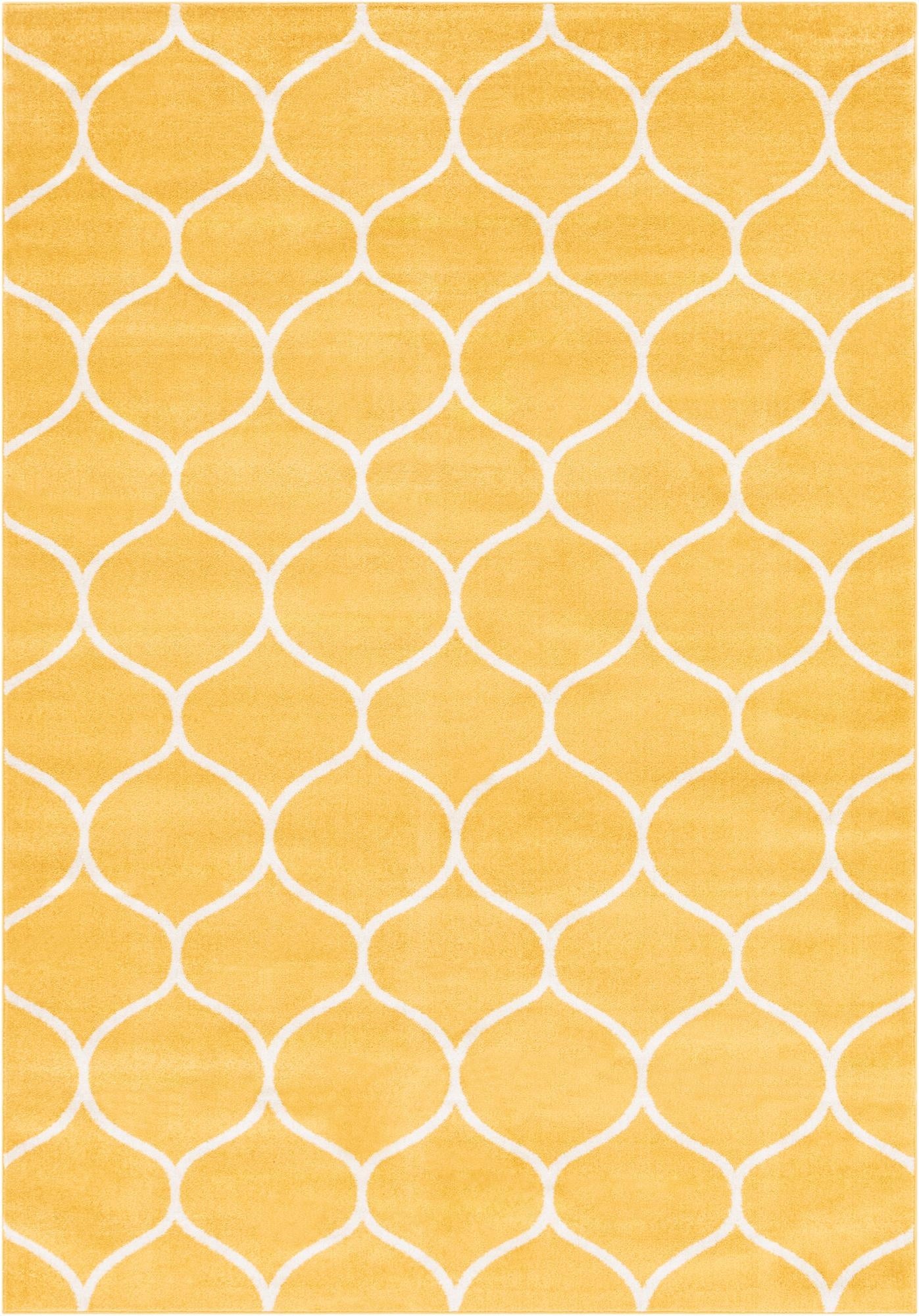 A 7x10 rectangular yellow area rug with a modern white trellis pattern, suitable for a living room.