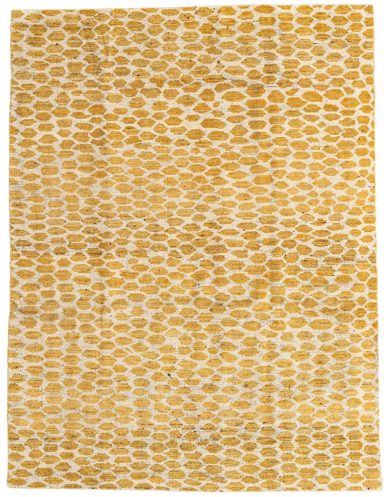 A 6x9 rectangular yellow and cream tribal shag rug with an abstract dotted pattern, suitable for a living room.