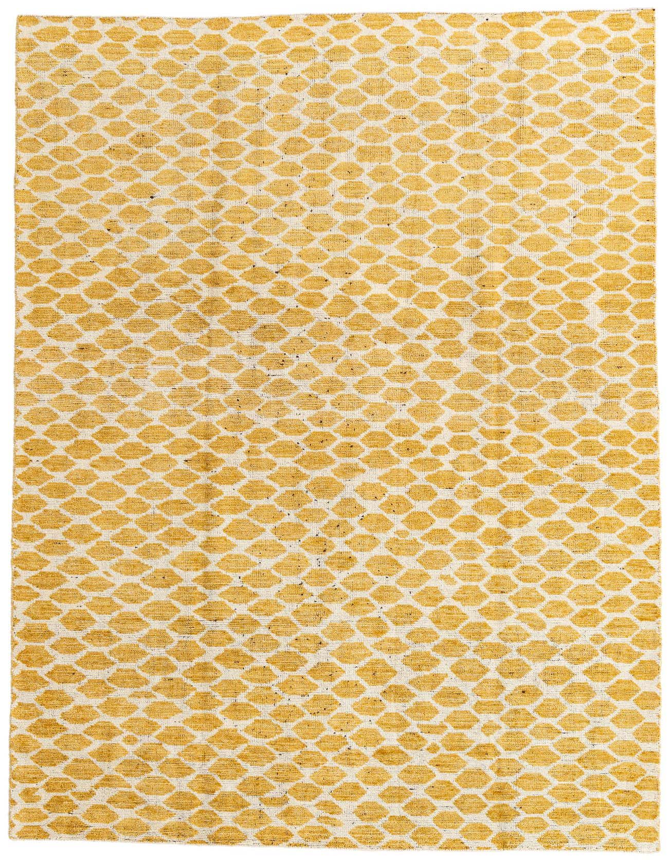 A 6x9 rectangular yellow and cream tribal shag rug with an abstract geometric pattern, suitable for a living room or bedroom.