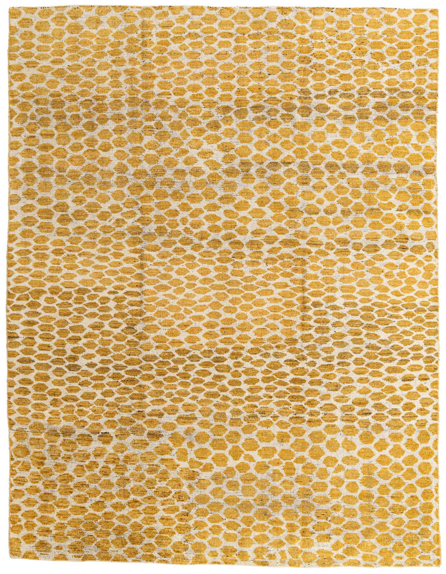 A rectangular 8x10 yellow and white shag rug with an abstract tribal pattern, suitable for a living room.