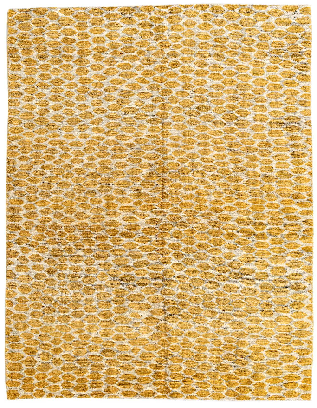 A 6x9 rectangular yellow and cream tribal shag rug with an abstract geometric pattern, suitable for a living room.