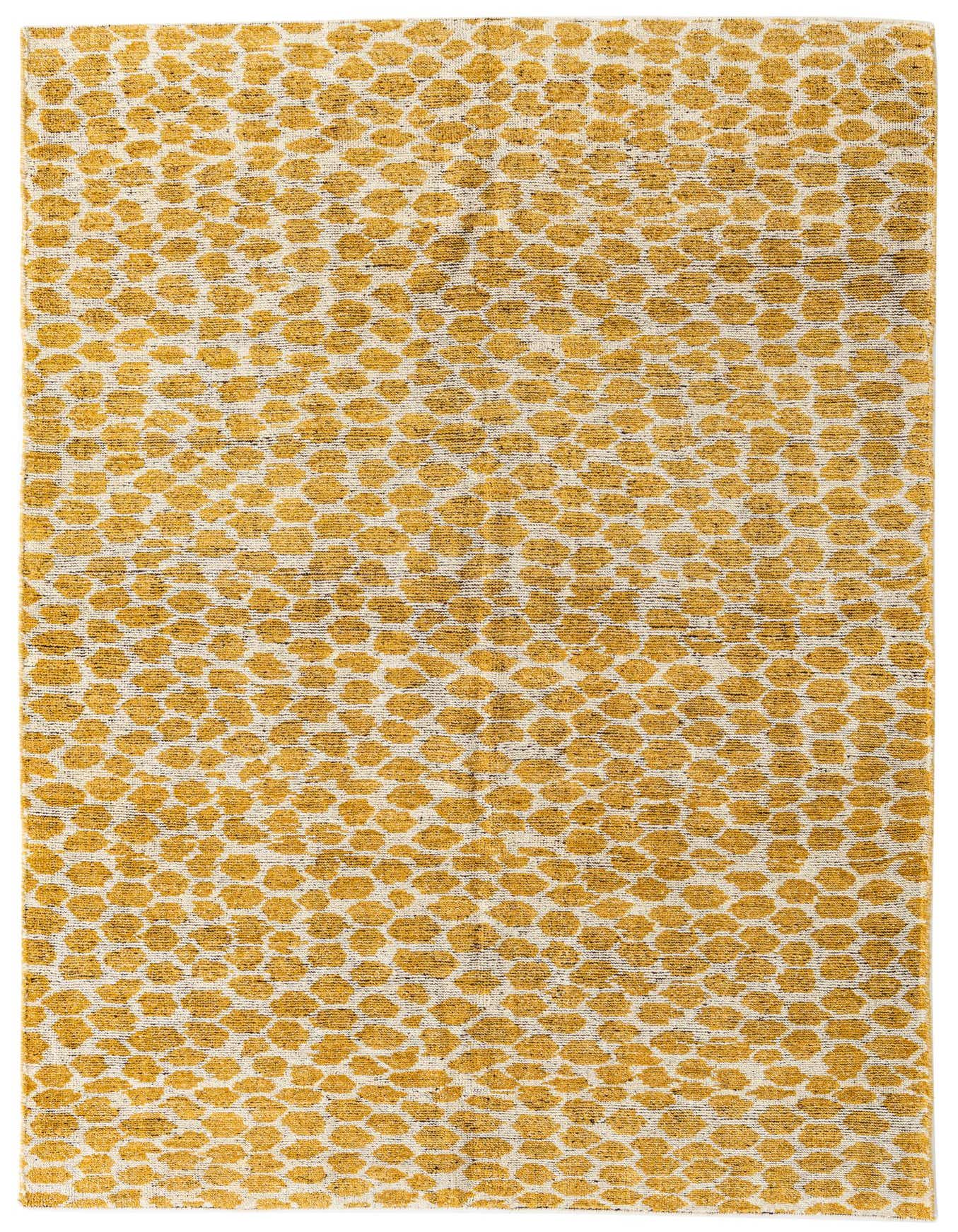 A 6x9 rectangular yellow and white shag rug with an abstract tribal pattern, perfect for a modern living room.