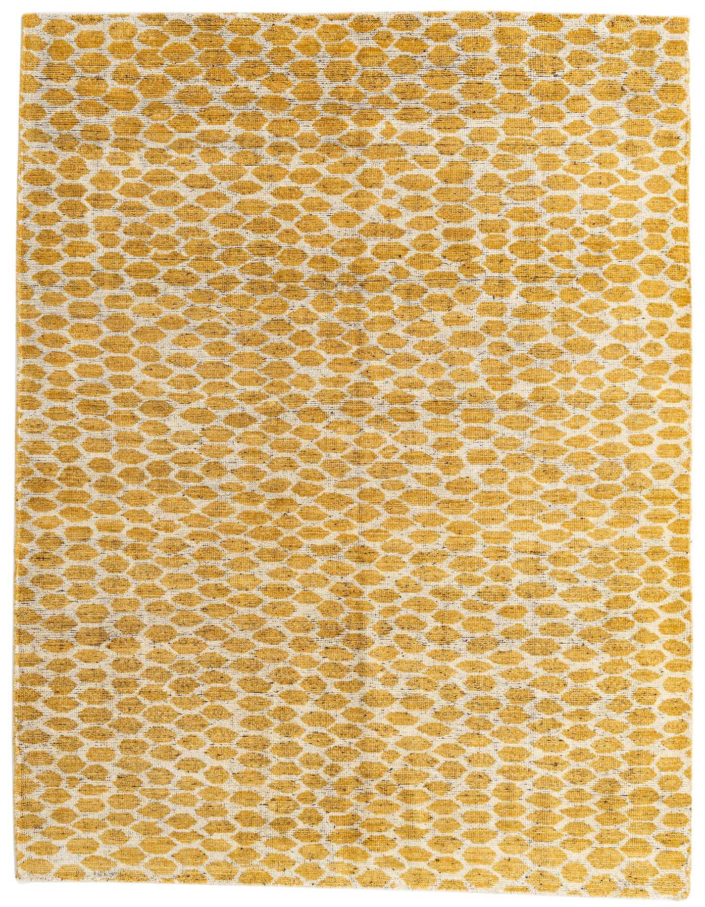 A 6x9 rectangular yellow and white tribal shag rug, handmade from wool, perfect for a living room.