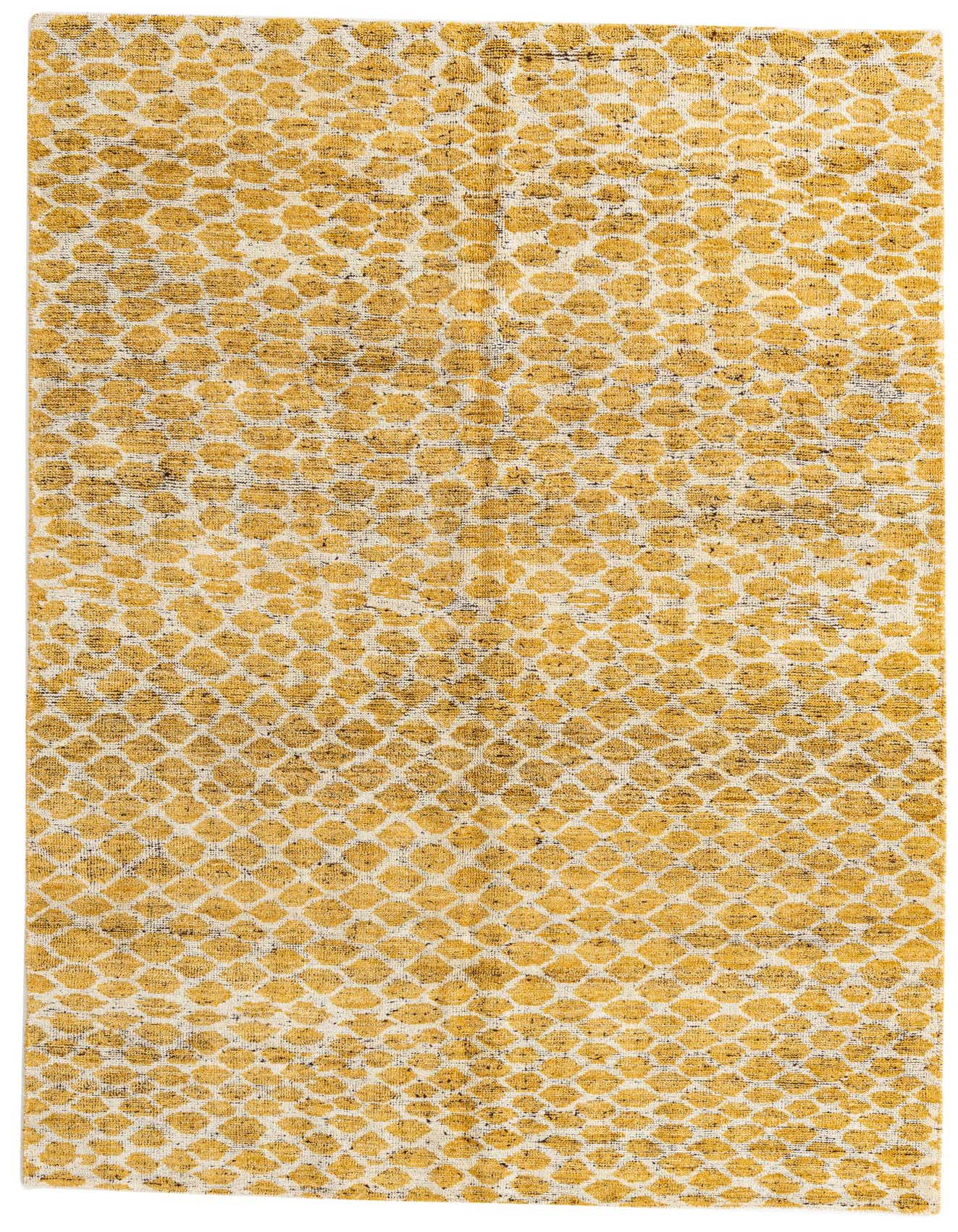 A 6x9 rectangular yellow and cream tribal shag rug with an abstract dotted pattern, perfect for a living room.