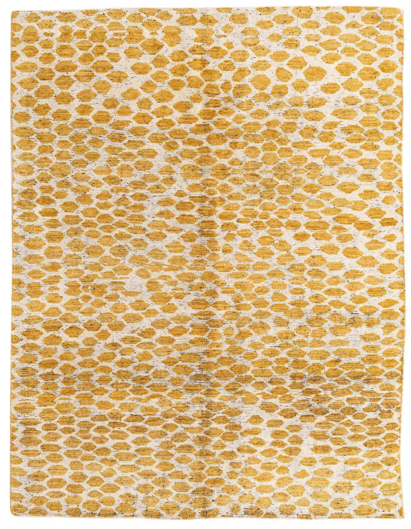 A 6x9 rectangular yellow and cream tribal shag rug with an abstract spotted pattern, suitable for a living room.