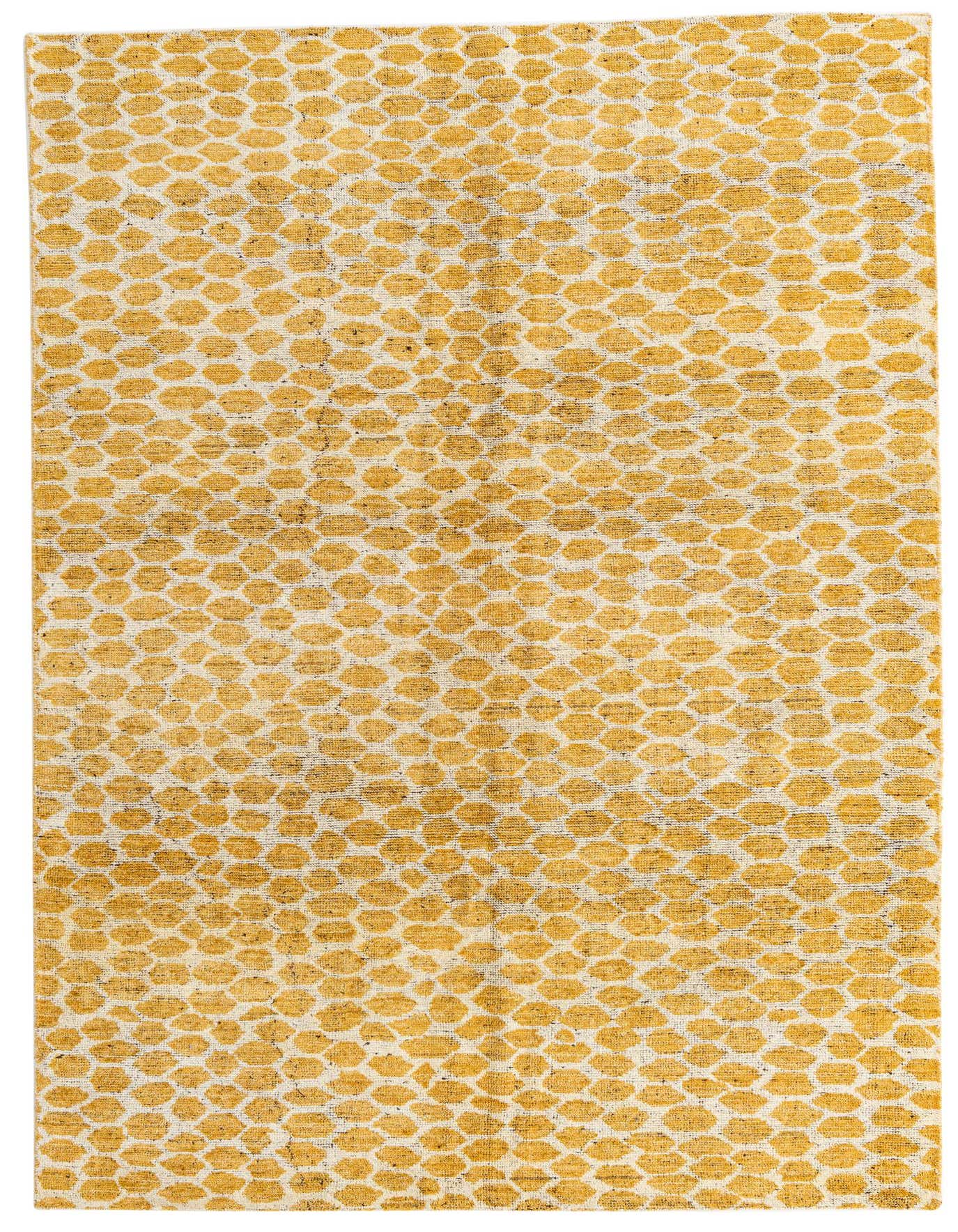 A 6x9 rectangular yellow and white tribal shag rug, handmade from wool, perfect for a living room.