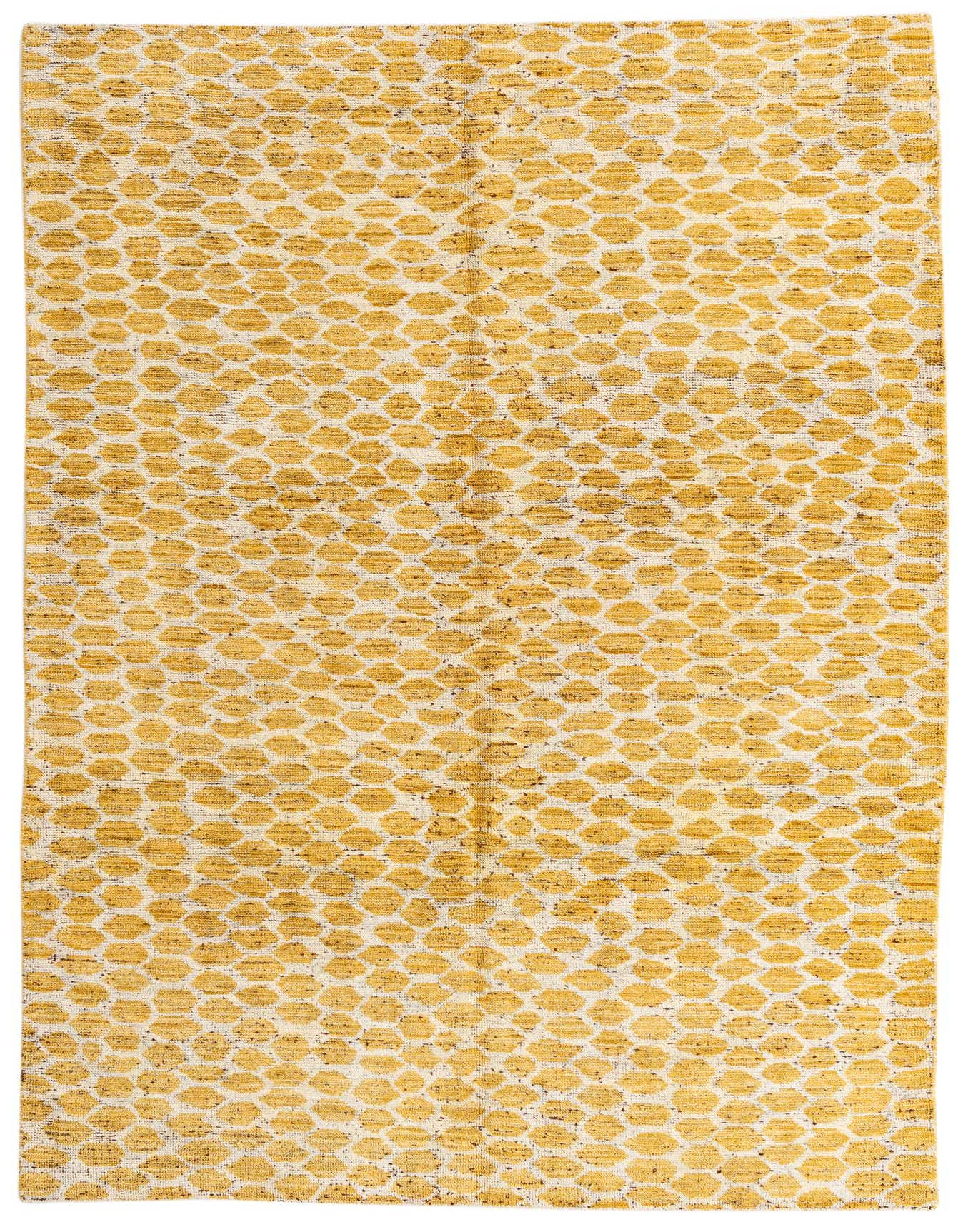 A 6x9 rectangular yellow and cream tribal shag rug with an abstract geometric pattern, perfect for a living room.