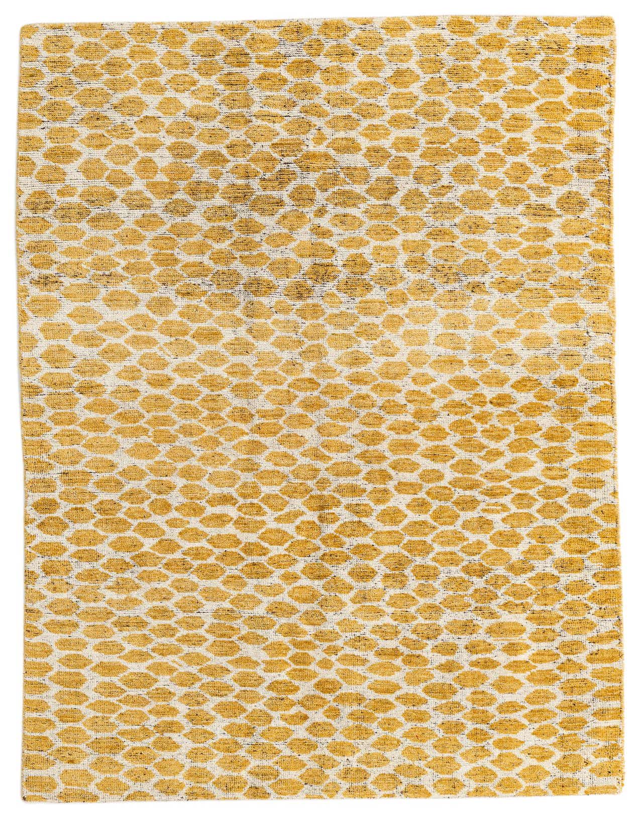 A 5x8 rectangular yellow and white tribal shag rug with an abstract honeycomb pattern, ideal for a living room.
