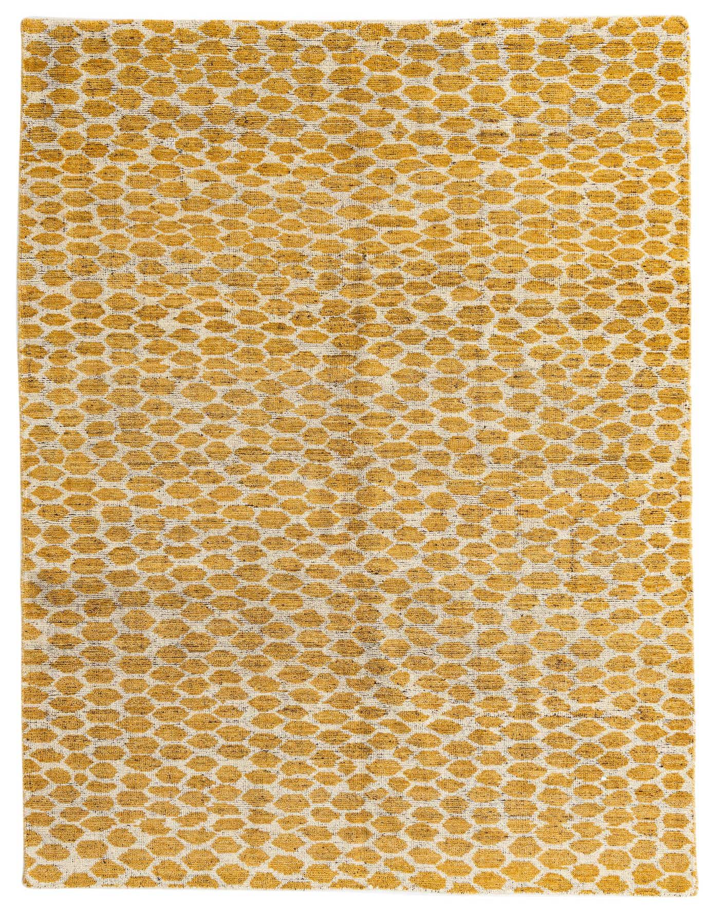 A 6x9 rectangular yellow and cream shag rug with an abstract tribal pattern, ideal for a living room.