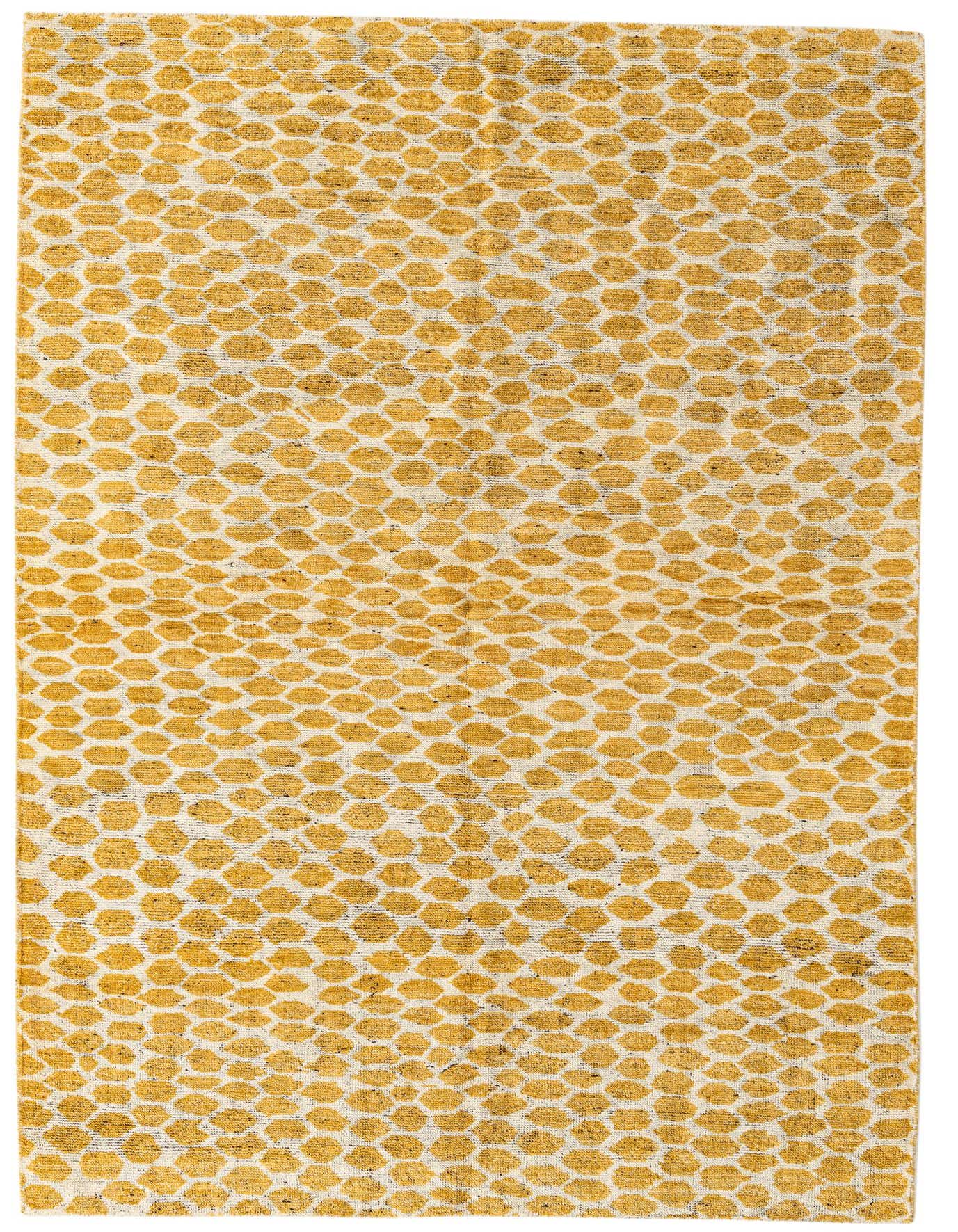 A 6x9 rectangular yellow and cream tribal shag rug with an abstract dotted pattern, perfect for a living room.