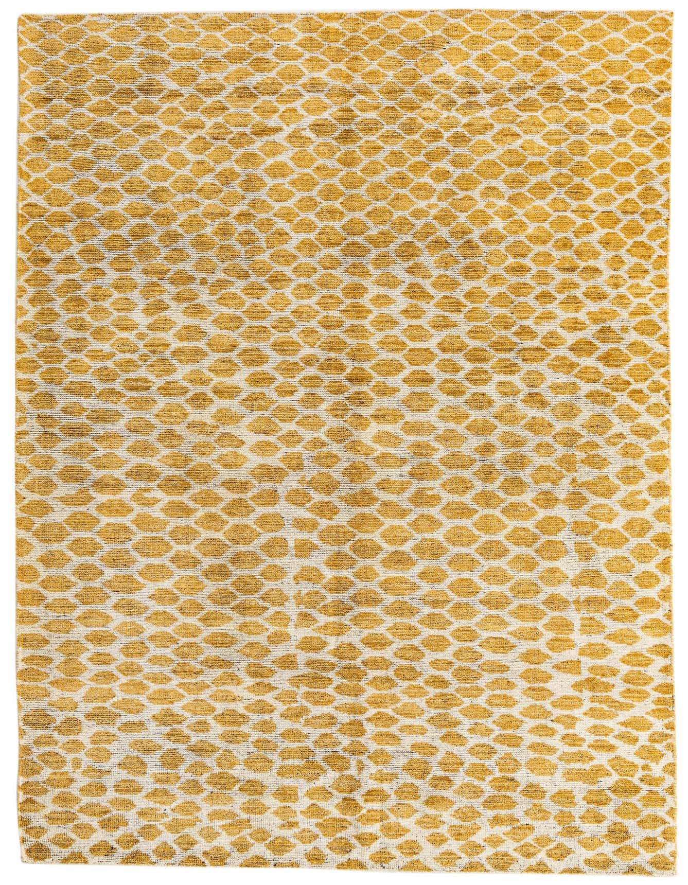 A 6x9 rectangular yellow and white tribal shag rug with an abstract geometric pattern, perfect for a living room.