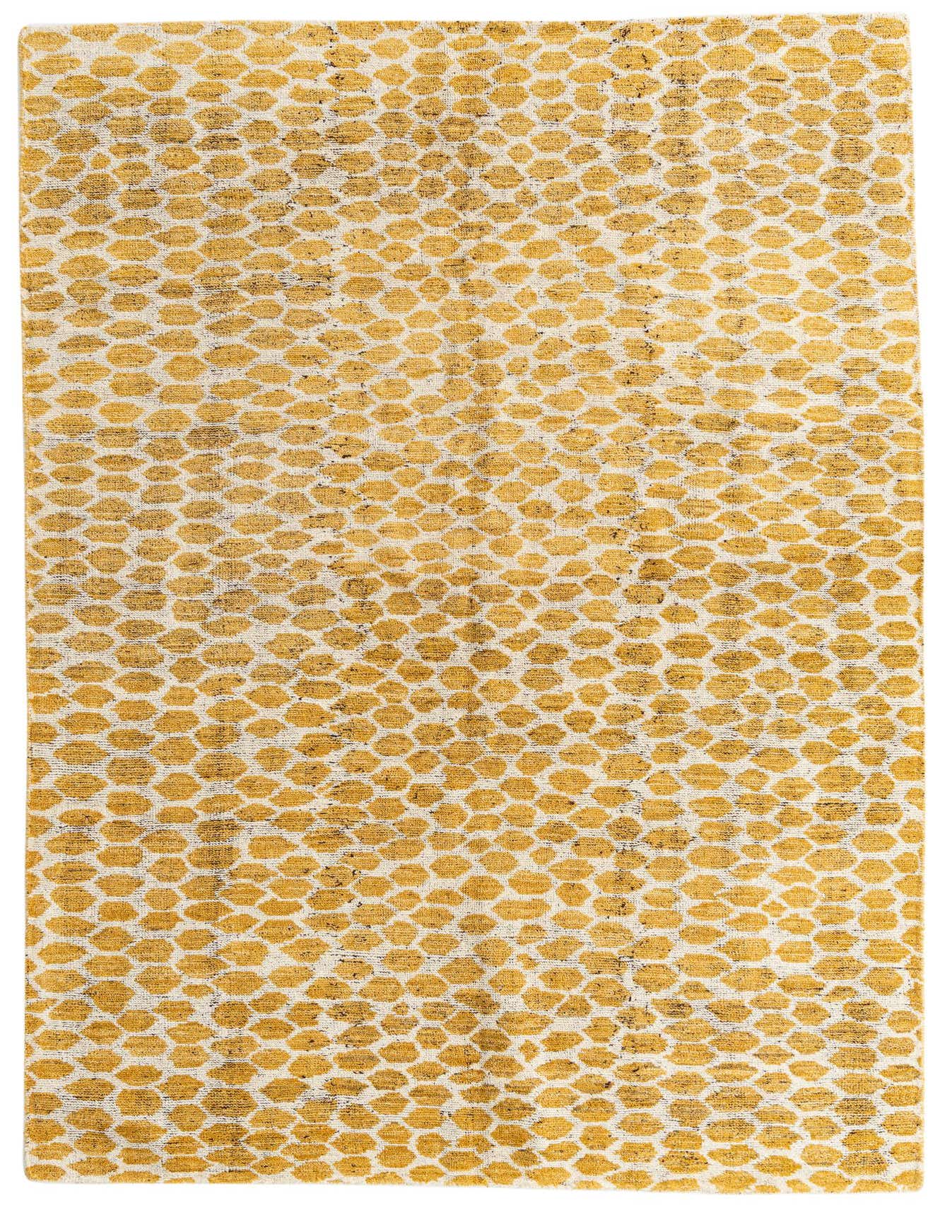 A 6x9 rectangular yellow and cream shag rug with an abstract tribal pattern, suitable for a living room.