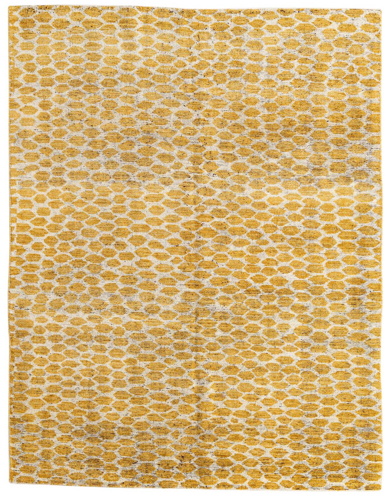 A 6x9 rectangular yellow and white tribal shag rug with an abstract geometric pattern, suitable for a living room.