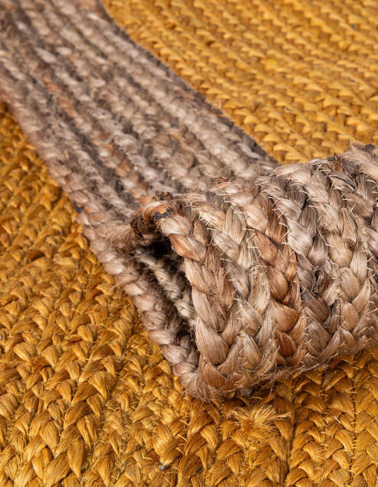 Detail image of  3' 3 x 3' 3  Hand Braided Jute Round Rug