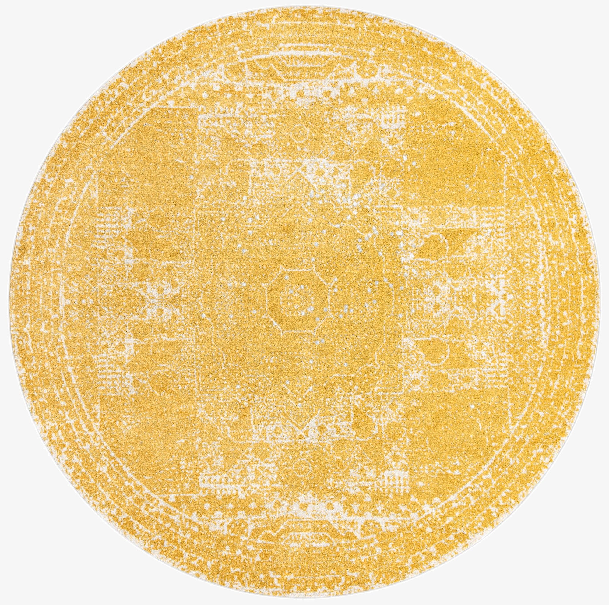 A 10-foot round yellow and white distressed medallion rug, featuring a blend of traditional and bohemian patterns.