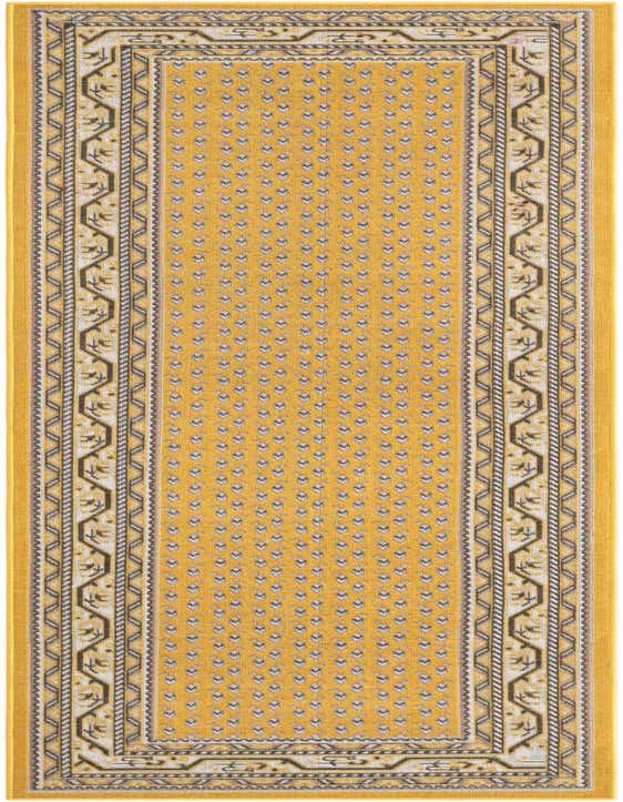 A 10 ft yellow Southwestern runner rug with a repeating pattern of small white and black motifs and a detailed border.