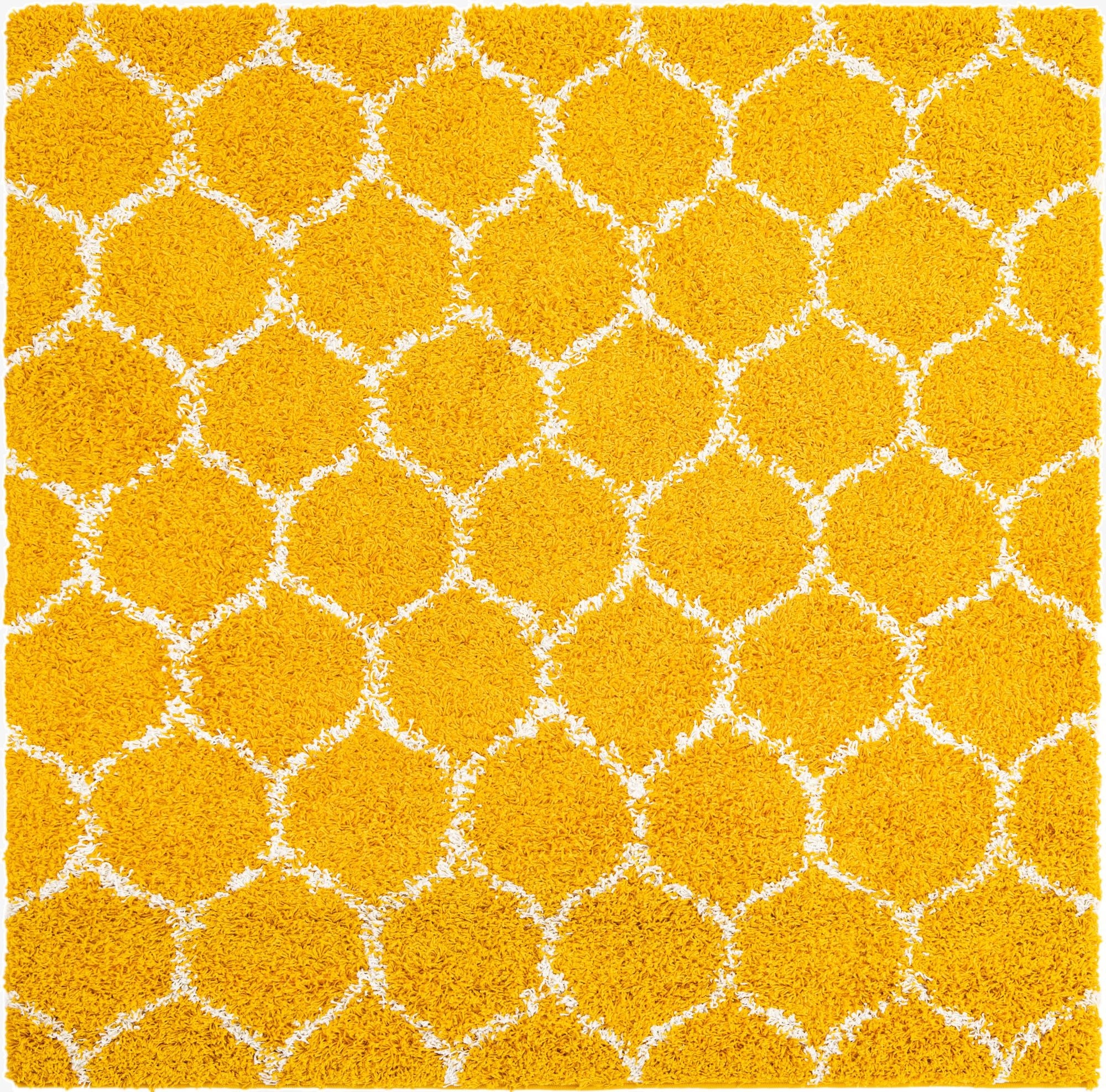 A 10'x10' square yellow area rug with a modern white trellis pattern and a textured high/low pile.
